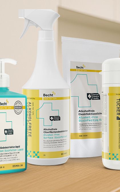 Becht disinfectant products on a work surface in a kitchen.