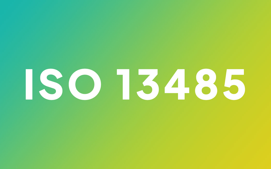 Graphic showing ISO 13485 on a green-yellow gradient background, symbolizing Alfred Becht’s medical device quality management certification.